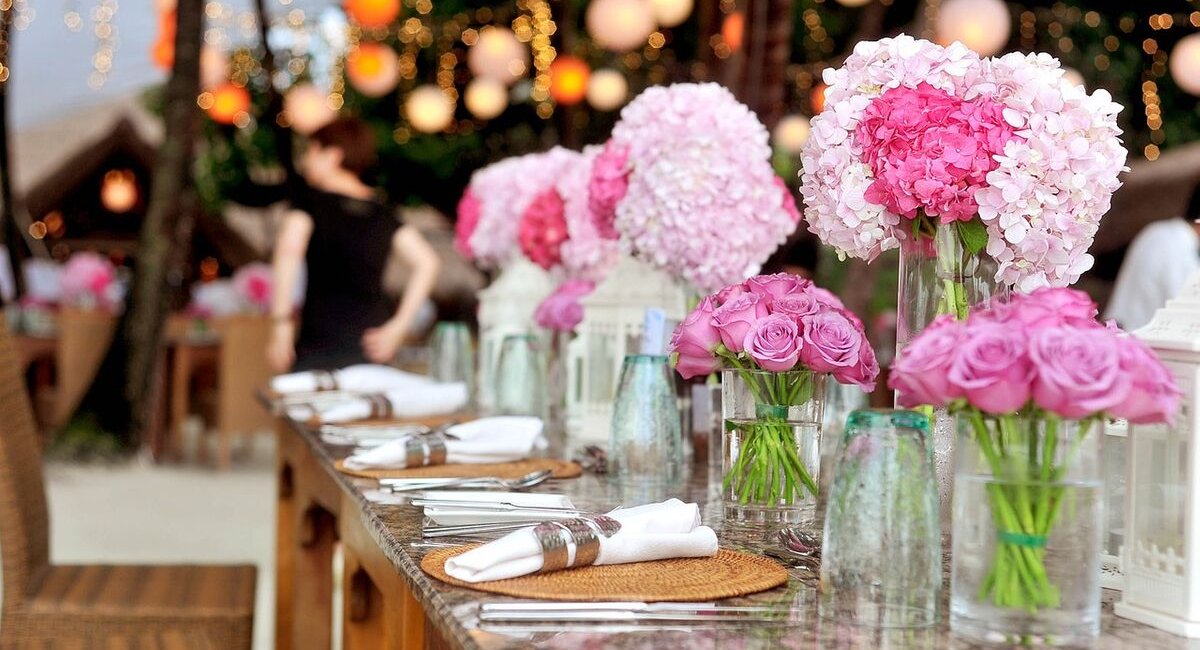 Wedding Loans | pink flowers at a wedding reception